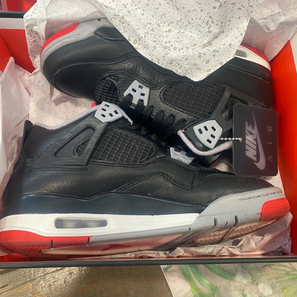 Air Jordan 4 Retro (GS), size 6. Excellent condition with original box.